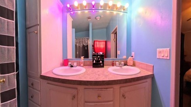 This 2002 double-wide manufactured home offers 3 bedrooms and 2 - photo 11