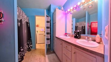 This 2002 double-wide manufactured home offers 3 bedrooms and 2 - photo 12