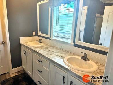 Welcome home to this beautiful 2022 manufactured home located in - photo 12