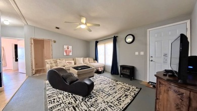 This 2002 double-wide manufactured home offers 3 bedrooms and 2 - photo 14