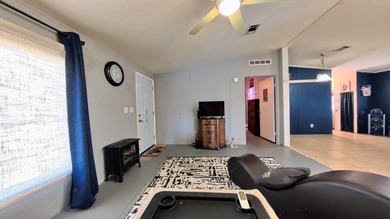 This 2002 double-wide manufactured home offers 3 bedrooms and 2 - photo 17