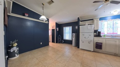This 2002 double-wide manufactured home offers 3 bedrooms and 2 - photo 18