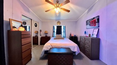 This 2002 double-wide manufactured home offers 3 bedrooms and 2 - photo 19