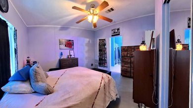 This 2002 double-wide manufactured home offers 3 bedrooms and 2 - photo 21