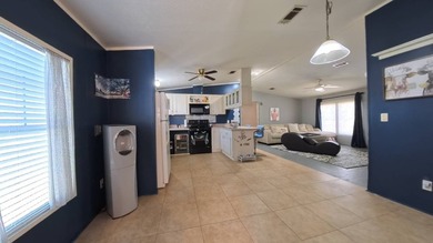 This 2002 double-wide manufactured home offers 3 bedrooms and 2 - photo 25