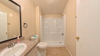This 2002 double-wide manufactured home offers 3 bedrooms and 2 - photo 27