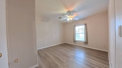 This 2002 double-wide manufactured home offers 3 bedrooms and 2 - photo 30