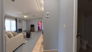 This 2002 double-wide manufactured home offers 3 bedrooms and 2 - photo 32