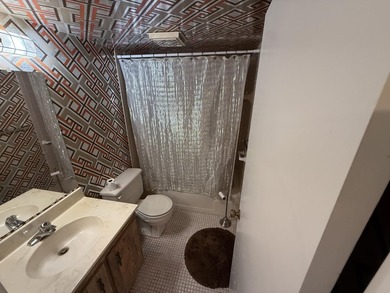 Enjoy penthouse living in the desirable gated section of - photo 6