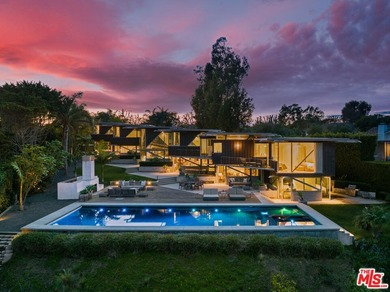 Ocean views, lush natural light, and dramatic angles animate the - photo 1