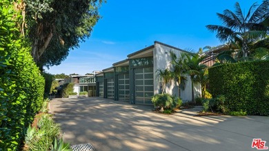 Ocean views, lush natural light, and dramatic angles animate the - photo 7