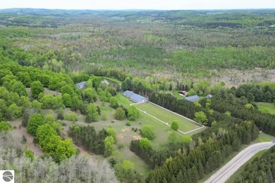 Legacy, Land and Lifestyle await. This exceptional Leelanau - photo 3