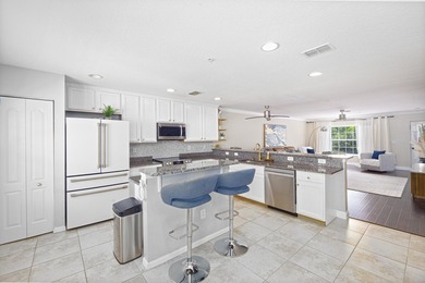 Welcome to this beautifully maintained turn-key three-story - photo 4