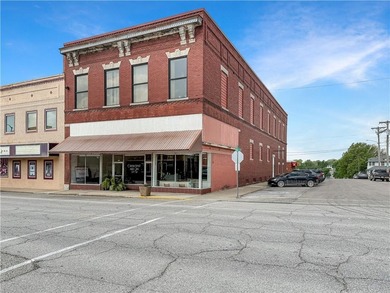 Welcome to a rare opportunity in downtown Higginsville--a