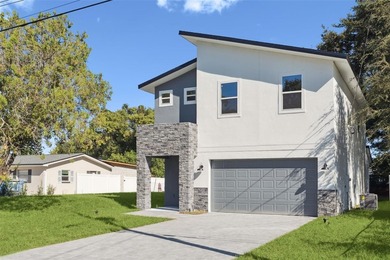 Modern Luxury in Belle Isle! This stunning 4-bedroom, 2.5-bath - photo 2
