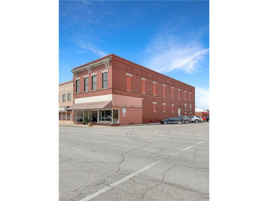 Welcome to a rare opportunity in downtown Higginsville--a