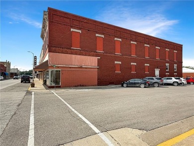 Welcome to a rare opportunity in downtown Higginsville--a