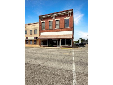 Welcome to a rare opportunity in downtown Higginsville--a