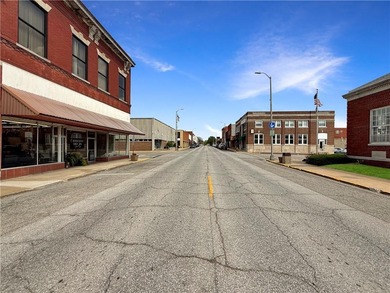Welcome to a rare opportunity in downtown Higginsville--a