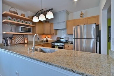 WELCOME TO THIS COZY AND SUNNY CONDO IN THE HEART OF DOWNTOWN