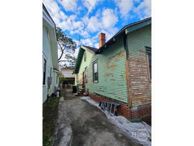 CALLING ALL CASH BUYERS TO THIS OVERSIZED DIAMOND IN THE ROUGH - photo 3