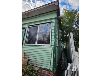 CALLING ALL CASH BUYERS TO THIS OVERSIZED DIAMOND IN THE ROUGH - photo 6