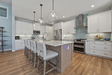Experience elevated coastal living in this 2023 custom-built - photo 6