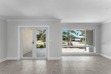 Experience luxury waterfront living in the prestigious Cove of - photo 2