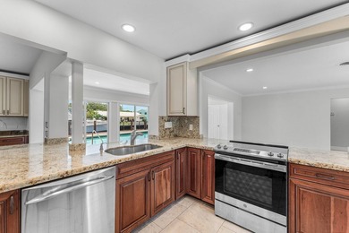 Experience luxury waterfront living in the prestigious Cove of - photo 9