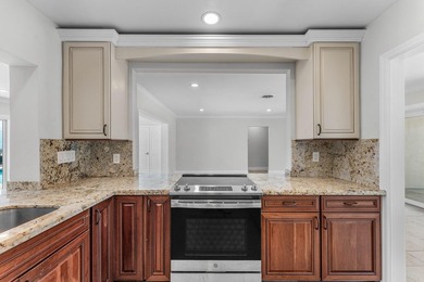 Experience luxury waterfront living in the prestigious Cove of - photo 10