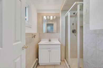 Charming Split-Level Gem in South Wantagh tucked away on a quiet - photo 16