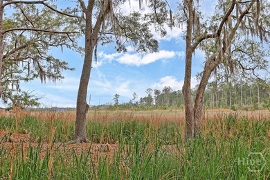 Gracefully set along sweeping marsh-front vistas, this - photo 58