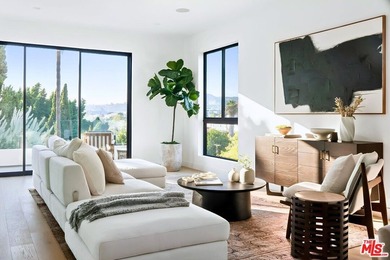 Perched above one of Silver Lake's most coveted corridors, this - photo 1