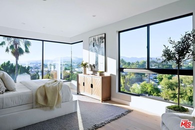 Perched above one of Silver Lake's most coveted corridors, this - photo 9
