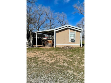 Lake Home For Sale in Graford, Texas