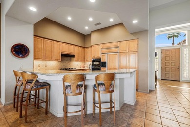 Commanding sweeping fairway and mountain views, this highly - photo 26