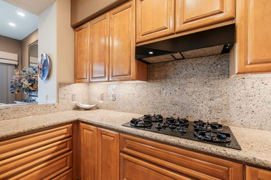 Commanding sweeping fairway and mountain views, this highly - photo 30
