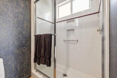 Commanding sweeping fairway and mountain views, this highly - photo 35