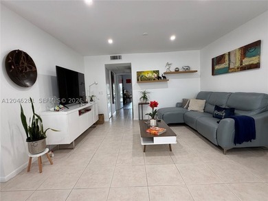 Beautifully renovated 2- bedroom, 2 bath, corner unit featuring - photo 4