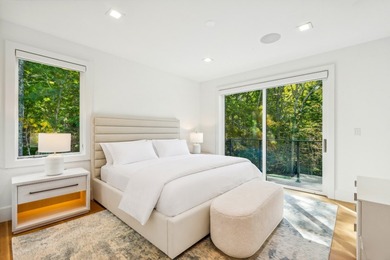 Offered fully furnished, this newly constructed contemporary - photo 12