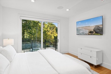 Offered fully furnished, this newly constructed contemporary - photo 13