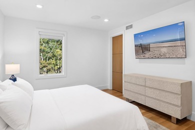 Offered fully furnished, this newly constructed contemporary - photo 15