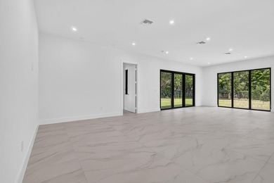 Welcome to this 2026 modern residence, nestled on a private - photo 7