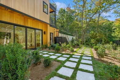 Offered fully furnished, this newly constructed contemporary - photo 24