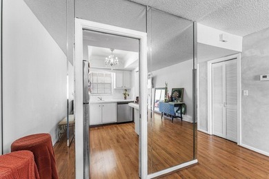 Top floor corner unit with panoramic views of the golf course - photo 5