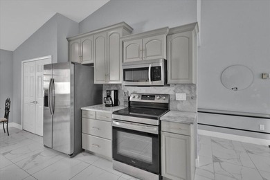 Welcome home to this beautifully remodeled and furnished - photo 19