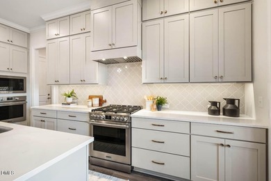 MOVE-IN READY! This beautifully designed executive townhome is - photo 19