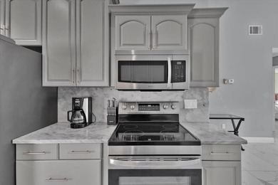 Welcome home to this beautifully remodeled and furnished - photo 20