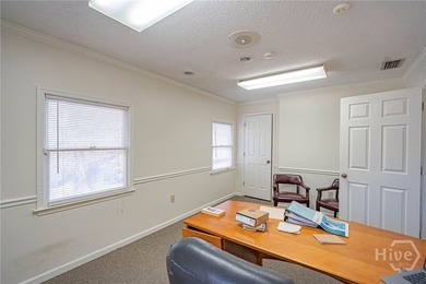 Units 12 and 14 offer a flexible second-story office condominium - photo 10