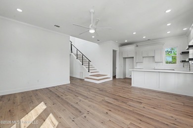 Enjoy coastal living on the beautiful Biloxi Back Bay in this - photo 4